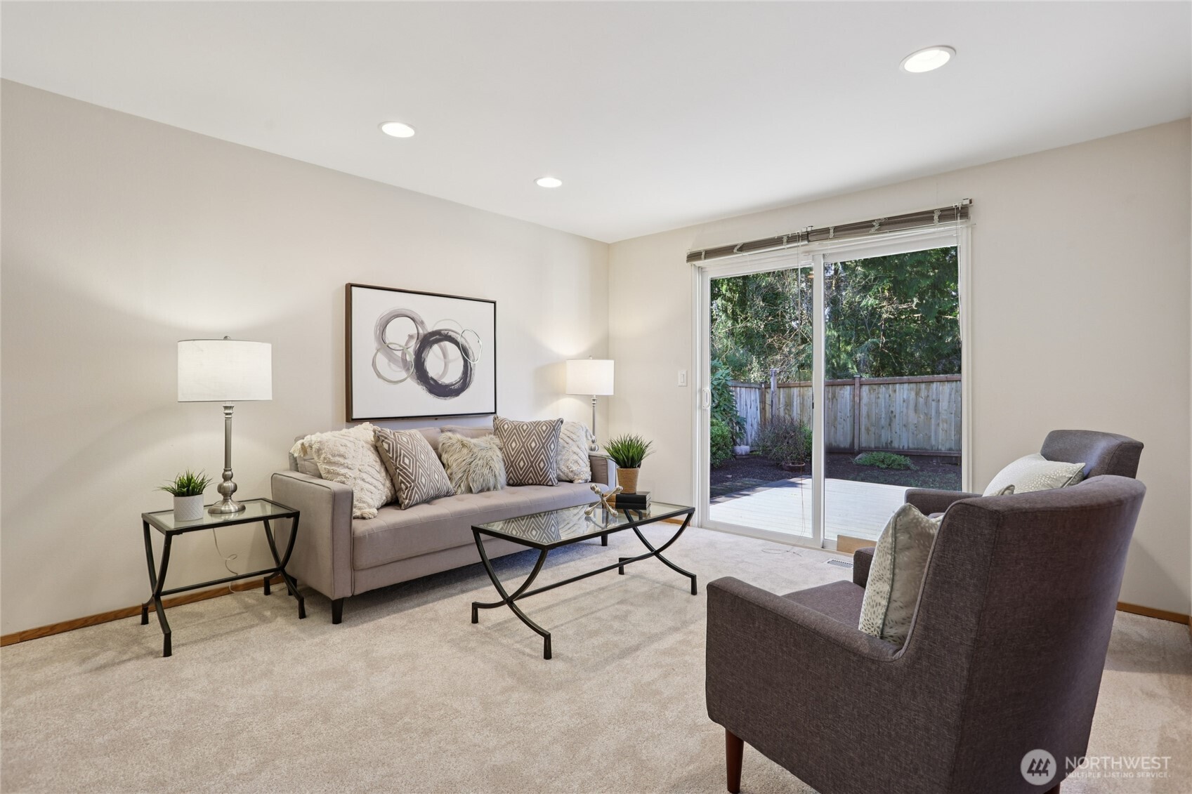 16535 147th Avenue Southeast Renton, WA 98058 - Photo 14 of 37 a living room with furniture and a lamp