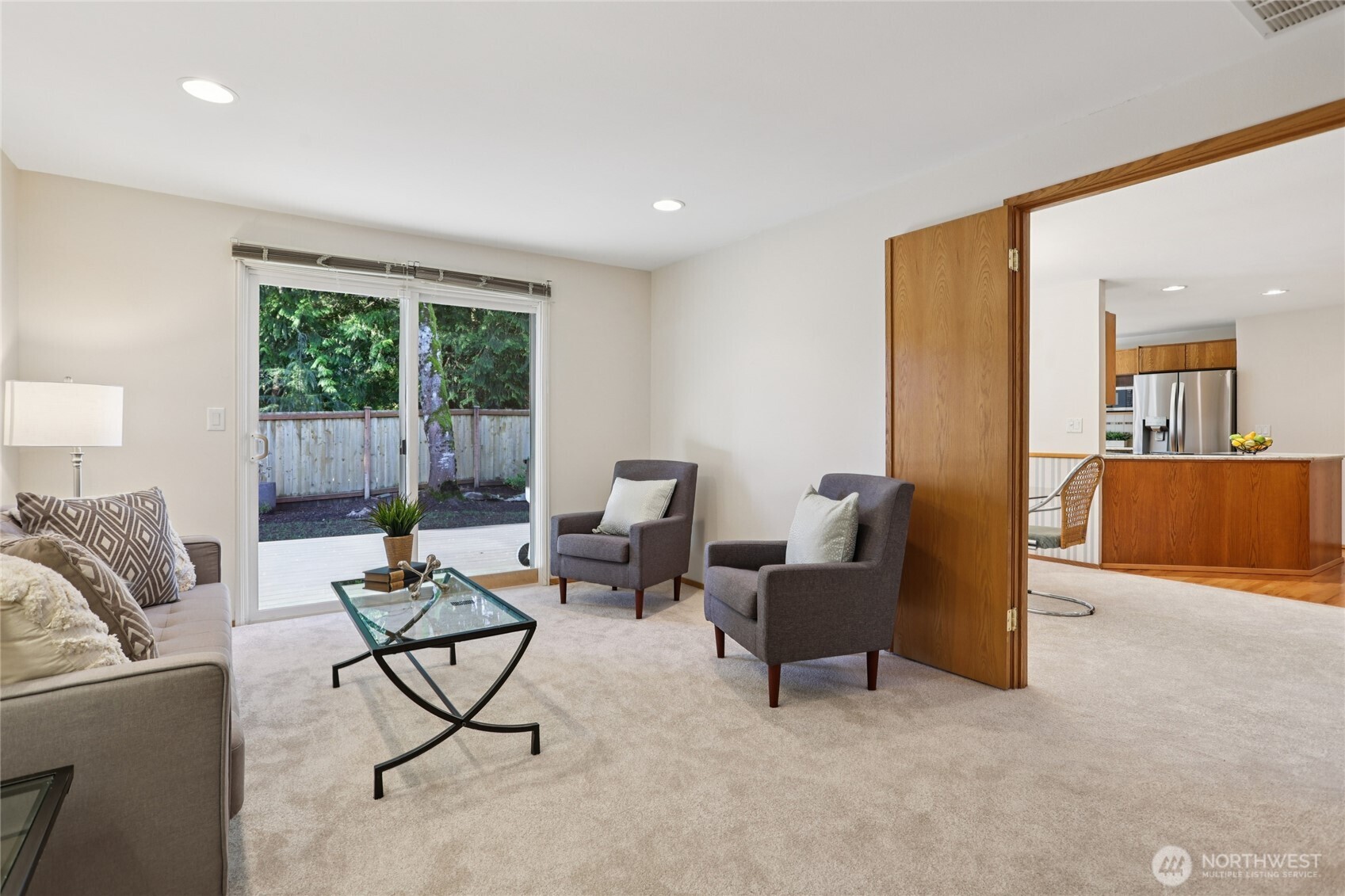16535 147th Avenue Southeast Renton, WA 98058 - Photo 15 of 37 a living room with furniture and a large window