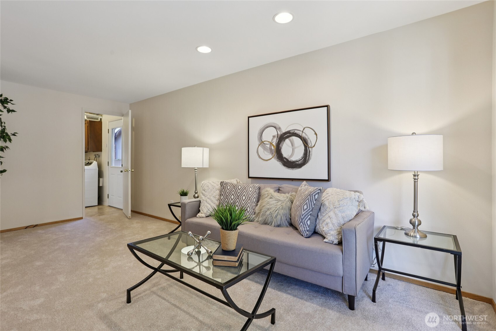 16535 147th Avenue Southeast Renton, WA 98058 - Photo 16 of 37 a living room with furniture and a lamp