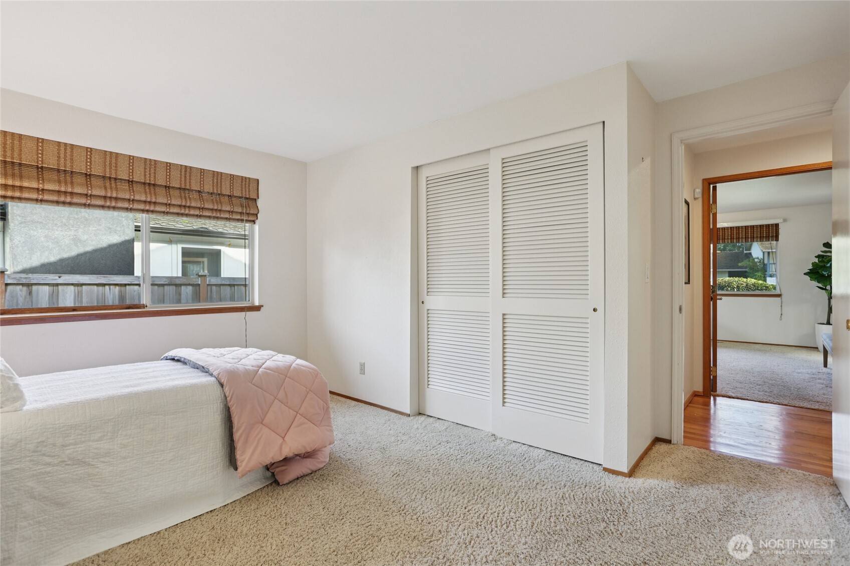 16535 147th Avenue Southeast Renton, WA 98058 - Photo 24 of 37 a bedroom with a bed and a large window