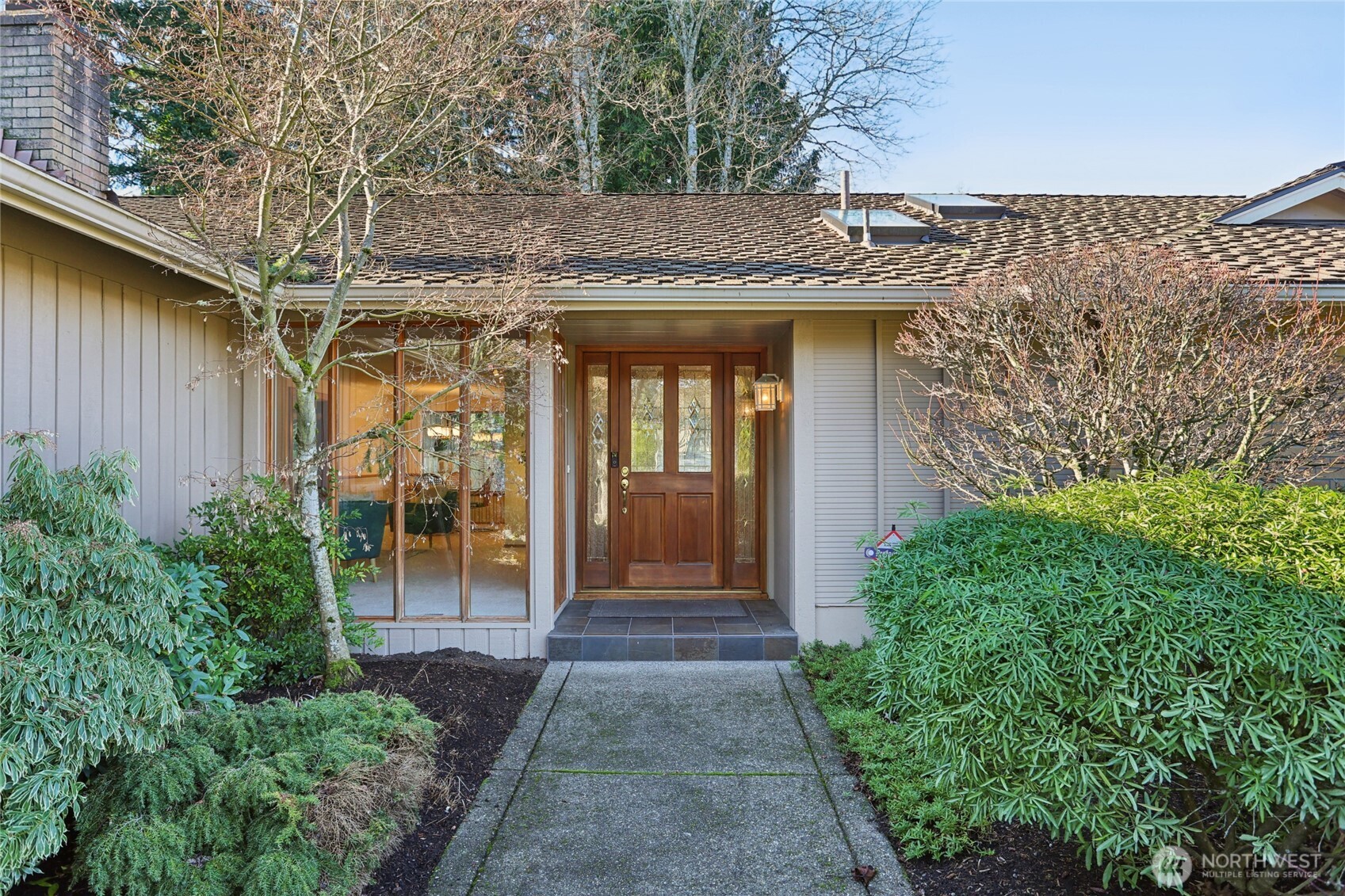 16535 147th Avenue Southeast Renton, WA 98058 - Photo 3 of 37 a view of a entrance gate of the house