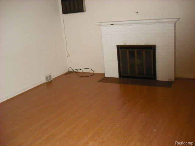 14287 Newburgh Road Livonia, MI 48154 - Photo 4 of 5 Livingroom Fireplace