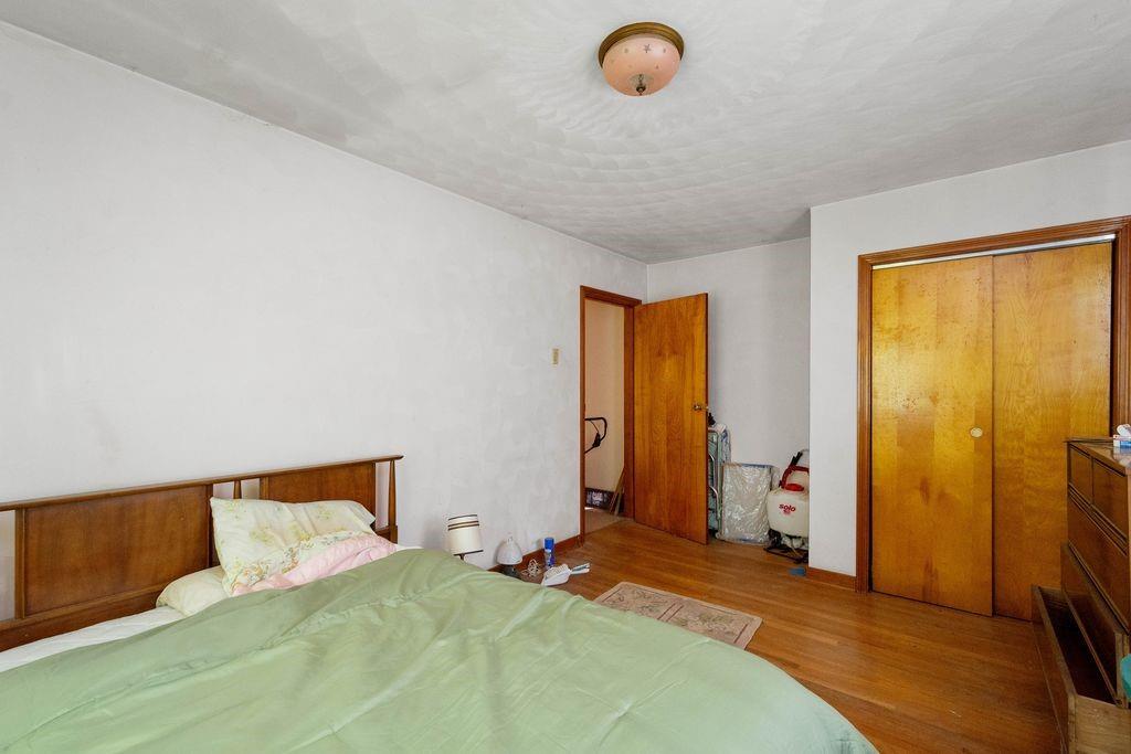 368 Turkeyfoot Road Venetia, PA 15367 - Photo 11 of 28 a bedroom with a bed and wooden floor