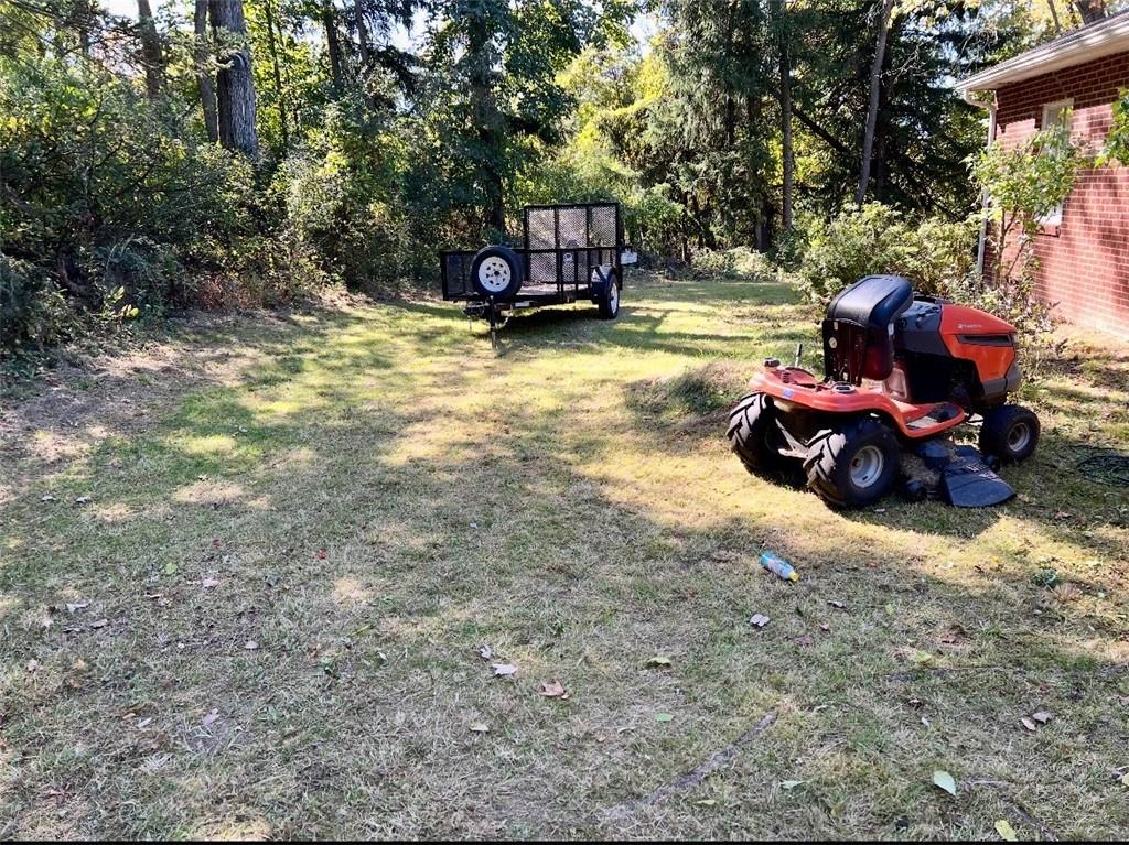 368 Turkeyfoot Road Venetia, PA 15367 - Photo 22 of 28 a backyard of a house with fire pit and outdoor seating