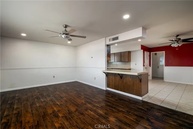 a view of a kitchen with a sink and a stove top oven