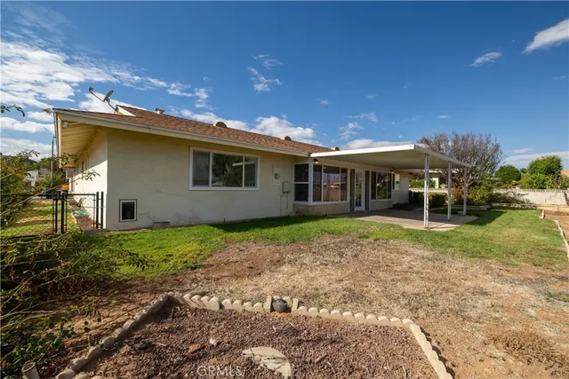 a view of swimming pool with a garden