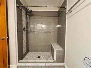 1015 West Sycamore Street Sherman, TX 75092 - Photo 25 of 35 a bathroom with a shower