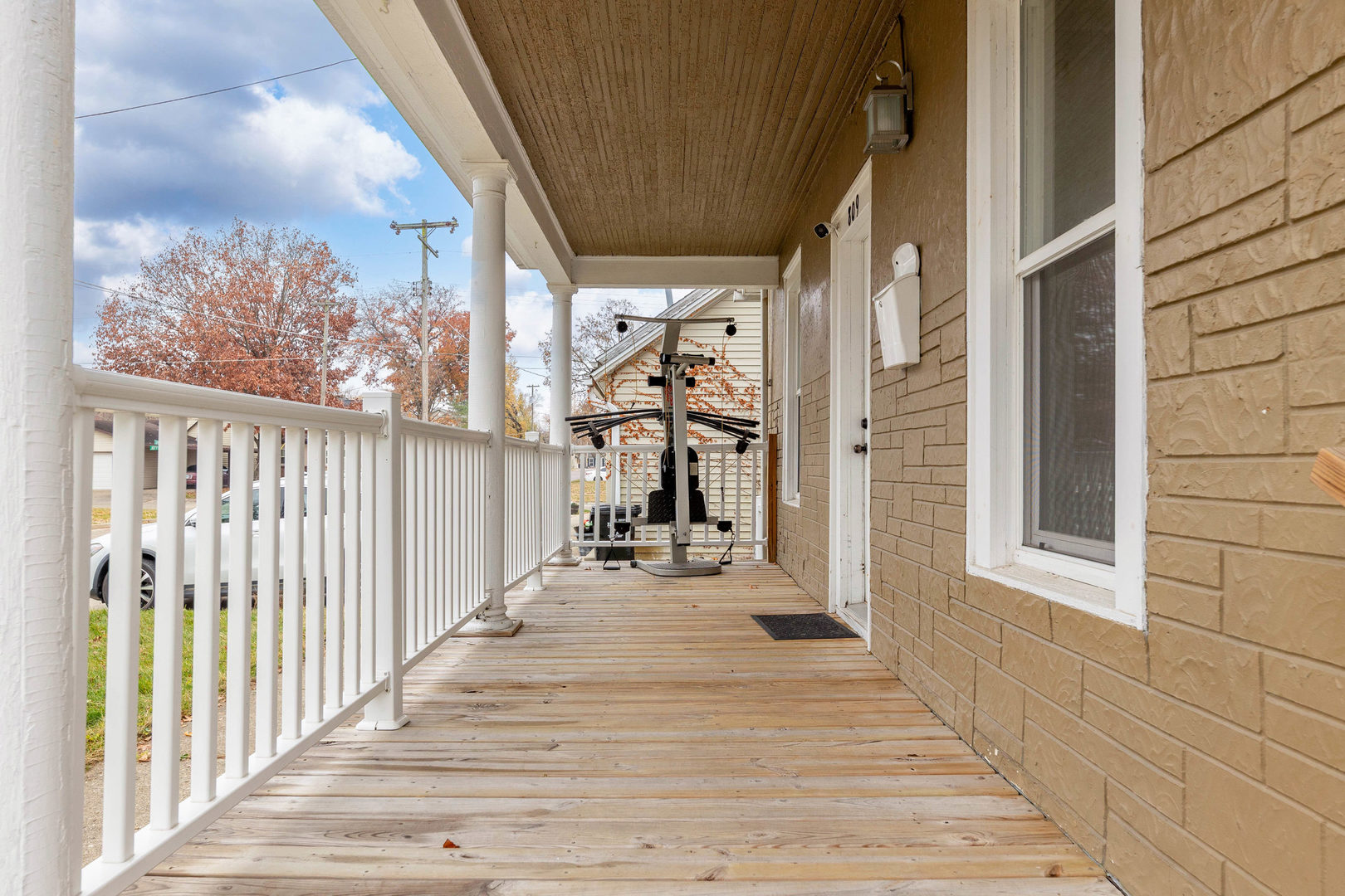 809 Poplar Street Ottawa, IL 61350 - Photo 21 of 22 a view of a porch with wooden floor and stairs