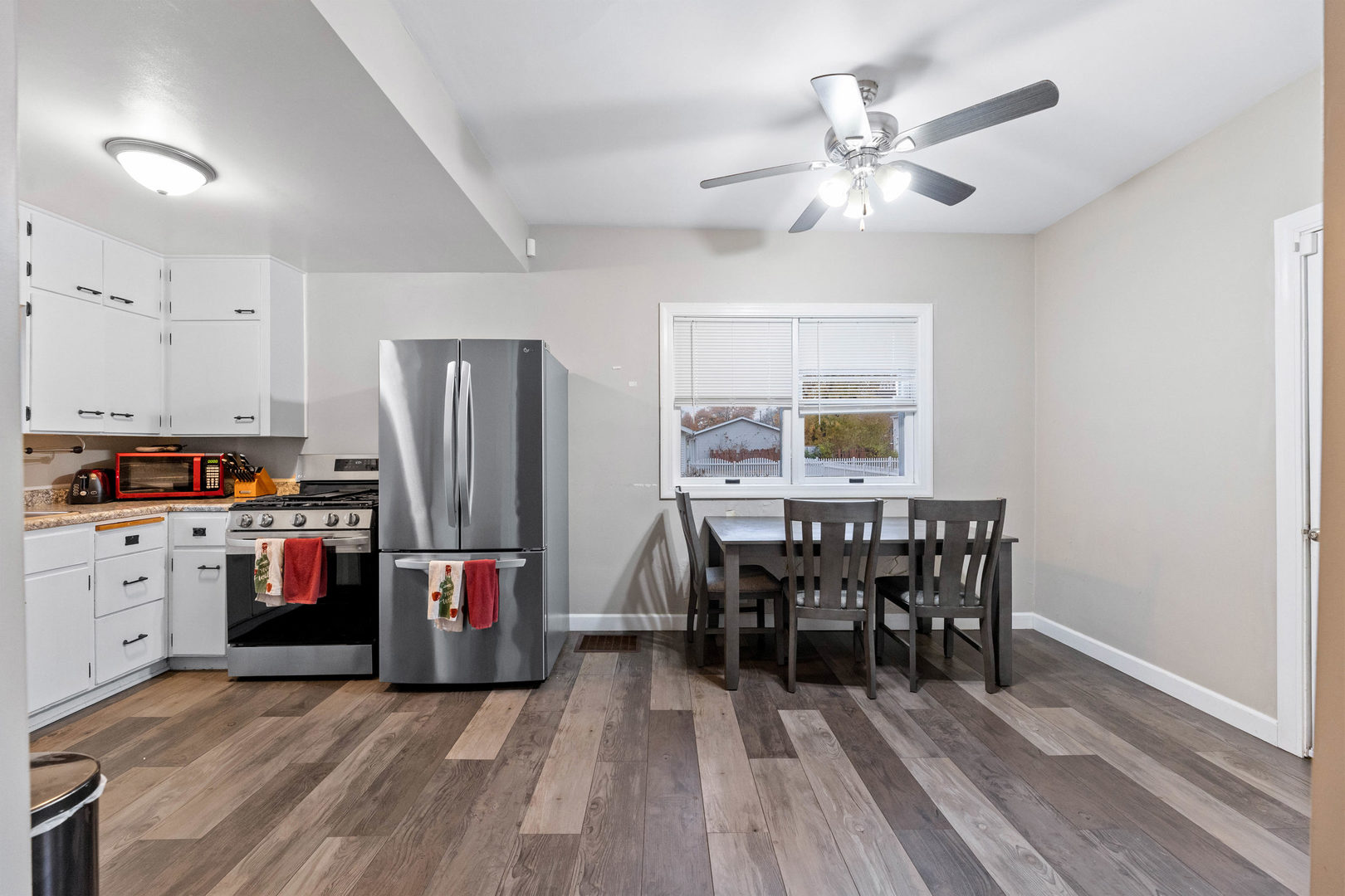 809 Poplar Street Ottawa, IL 61350 - Photo 5 of 22 a view of kitchen and refrigerator in kitchen
