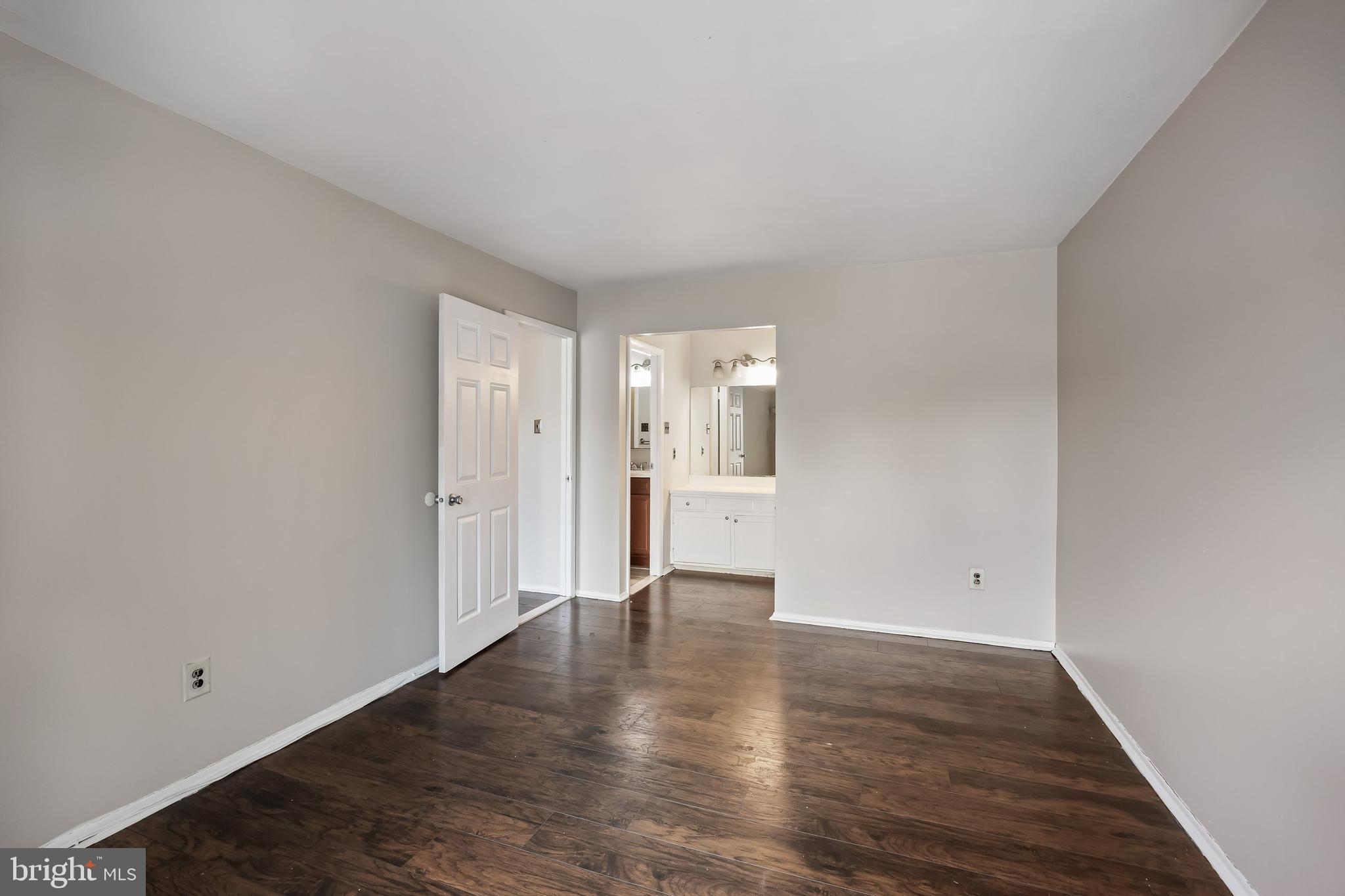 45 Sandra Road Voorhees, NJ 08043 - Photo 16 of 28 a view of an empty room with wooden floor and a window