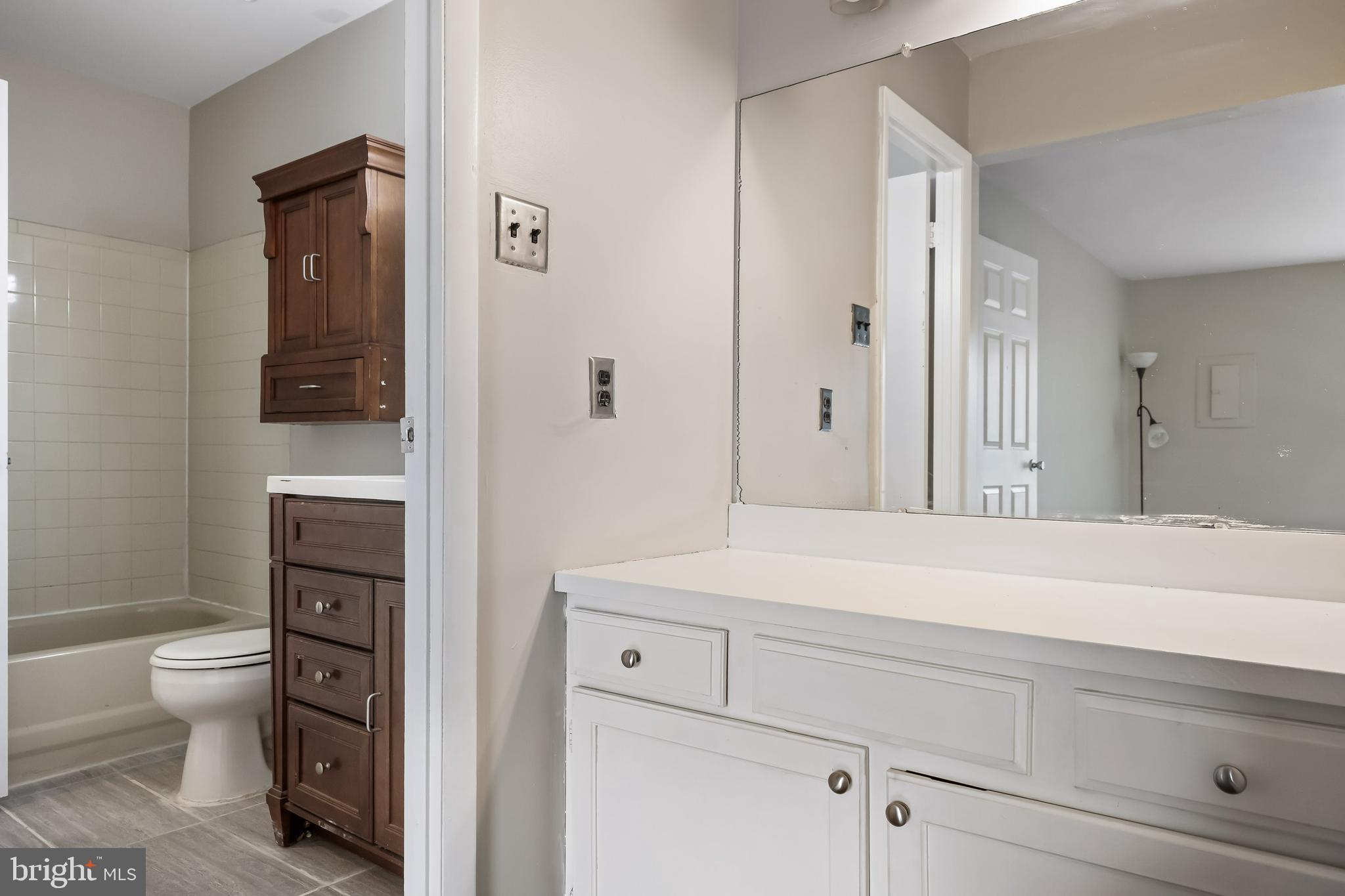 45 Sandra Road Voorhees, NJ 08043 - Photo 17 of 28 a bathroom with a sink a toilet and shower