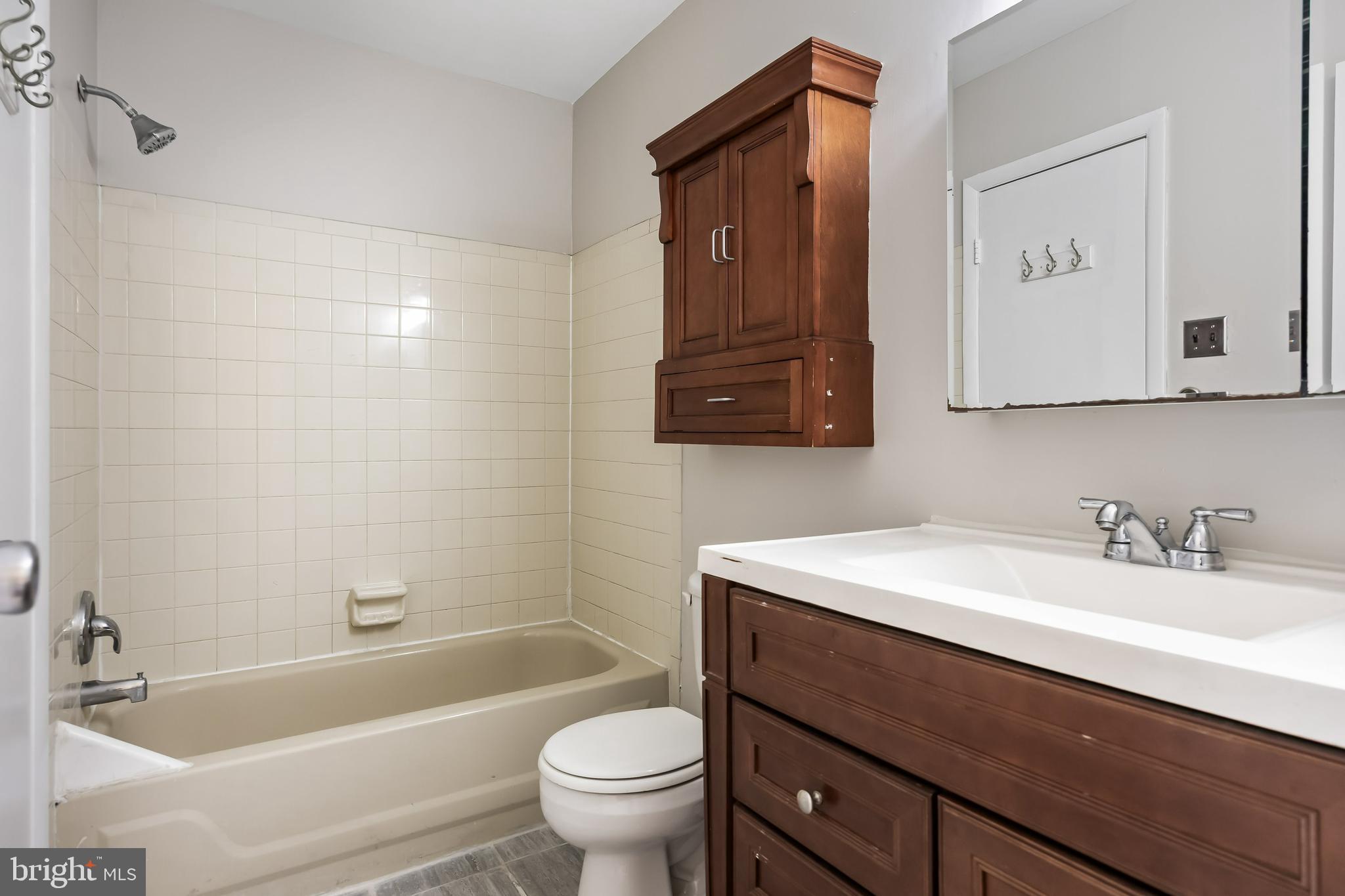 45 Sandra Road Voorhees, NJ 08043 - Photo 20 of 28 a bathroom with a sink a toilet and shower