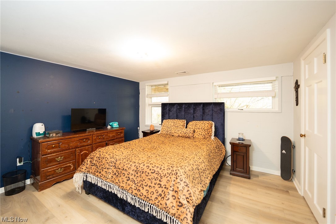 17064 Catsden Road Chagrin Falls, OH 44023 - Photo 15 of 16 Bedroom featuring light hardwood / wood-style flooring