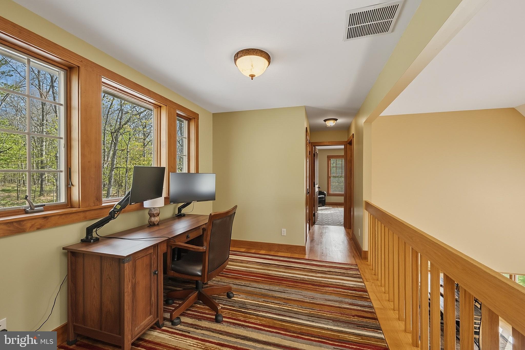 185 Ruta Lane Swanton, MD 21561 - Photo 67 of 81 a workspace with wooden floor and furniture