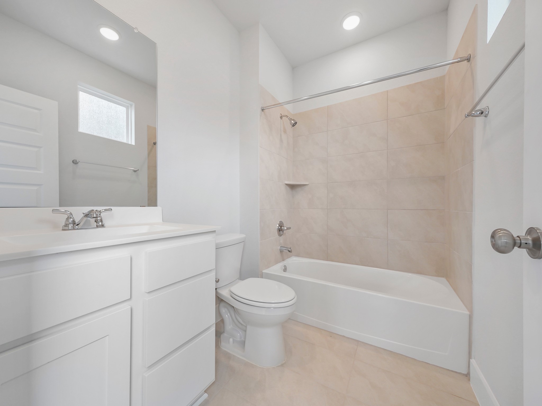 6010 Rolling Strm Court Fulshear, TX 77441 - Photo 14 of 23 The first floor features a convenient secondary bathroom located just outside the secondary bedroom.