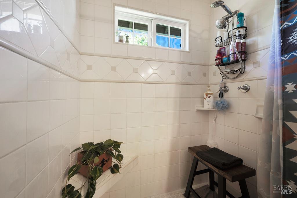 23180 Maffei Road Sonoma, CA 95476 - Photo 26 of 61 Hall bathroom shower with window.
