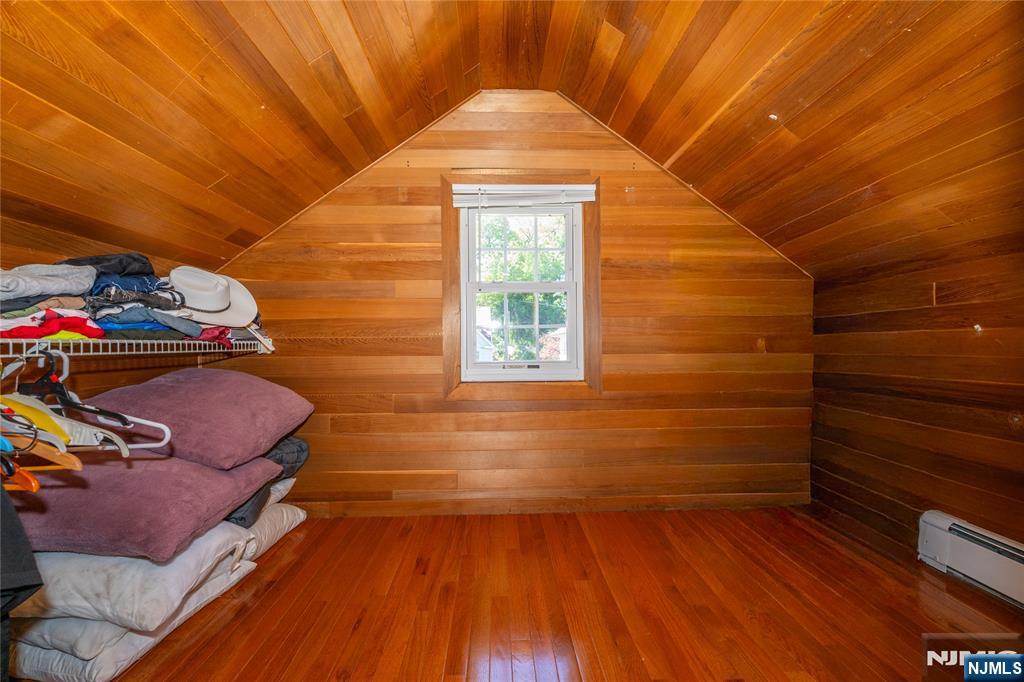 690 Garden Street Maywood, NJ 07607 - Photo 39 of 49 a bedroom with a bed and a window