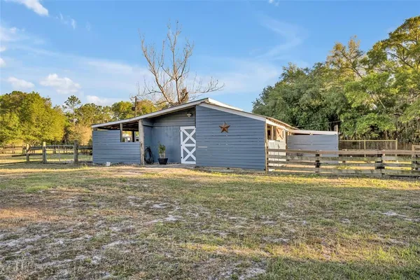 a house view with a outdoor space
