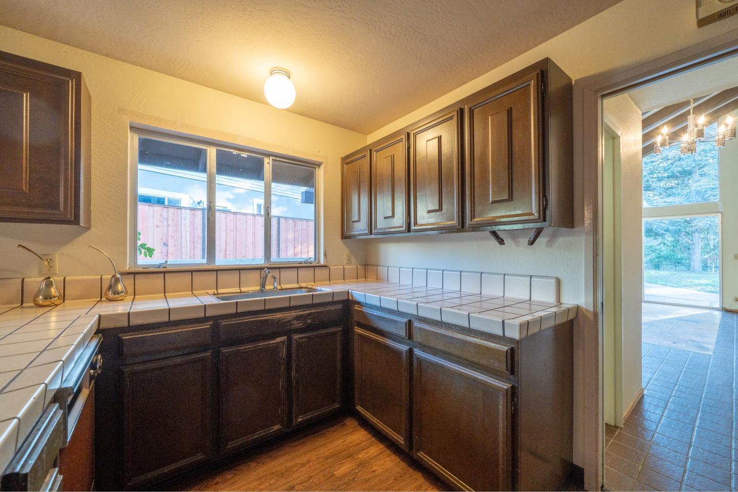 935 Park Pacifica Avenue Pacifica, CA 94044 - Photo 14 of 44 a kitchen with stainless steel appliances granite countertop a sink stove and cabinets