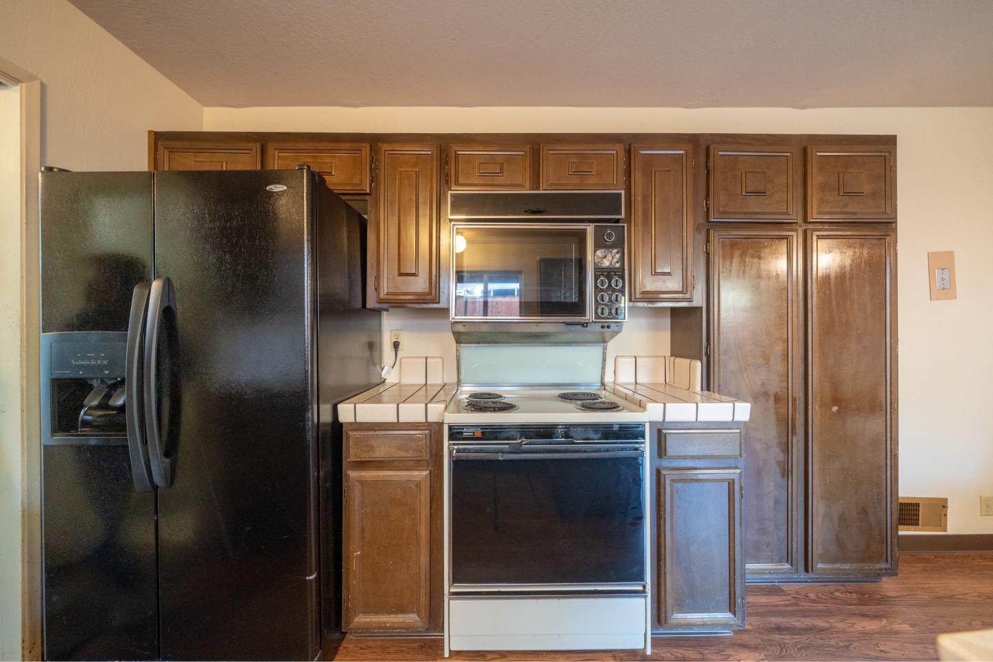 935 Park Pacifica Avenue Pacifica, CA 94044 - Photo 17 of 44 a kitchen with stainless steel appliances granite countertop a refrigerator and a stove
