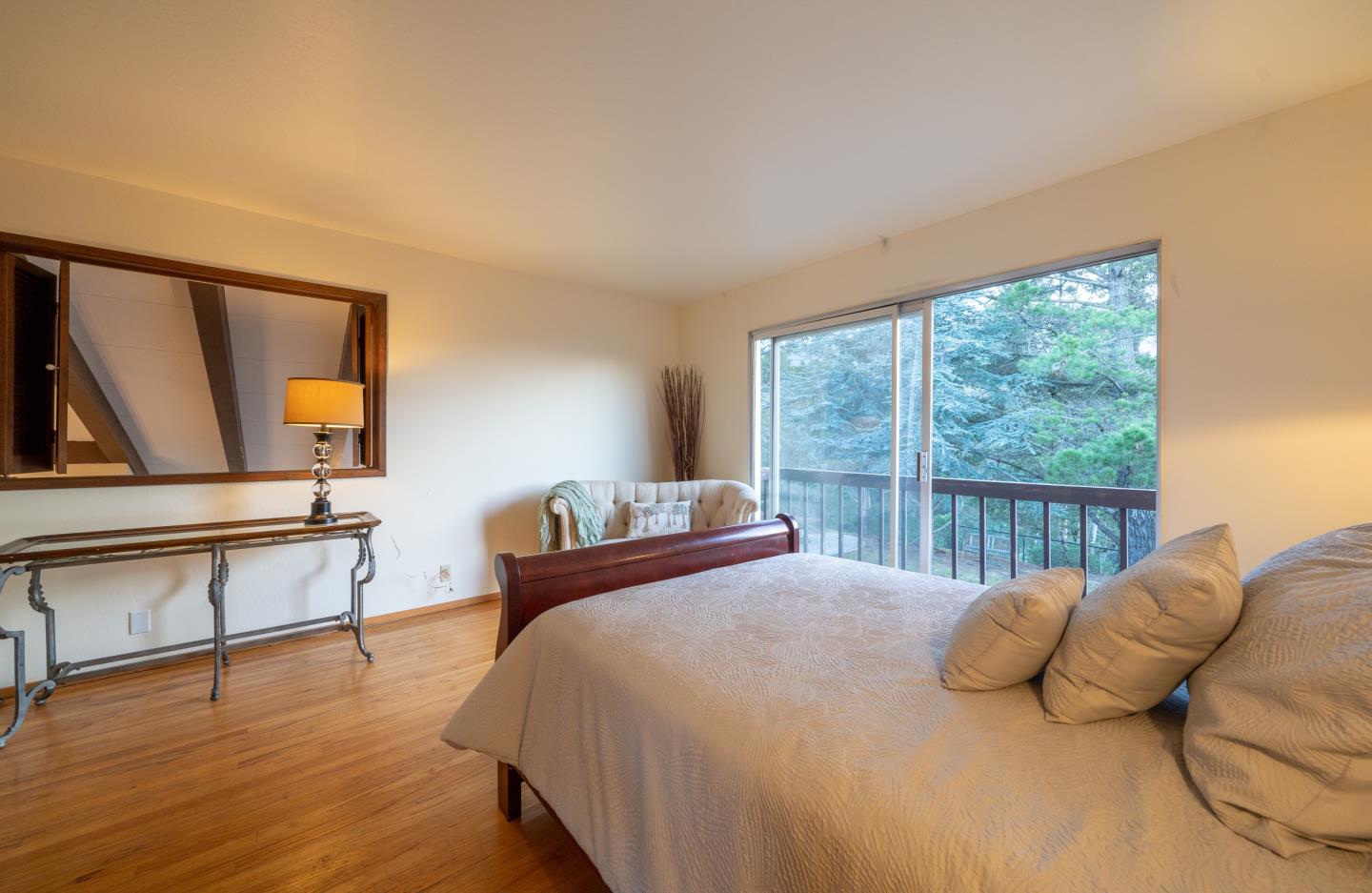 935 Park Pacifica Avenue Pacifica, CA 94044 - Photo 22 of 44 a bedroom with a bed a window and dresser