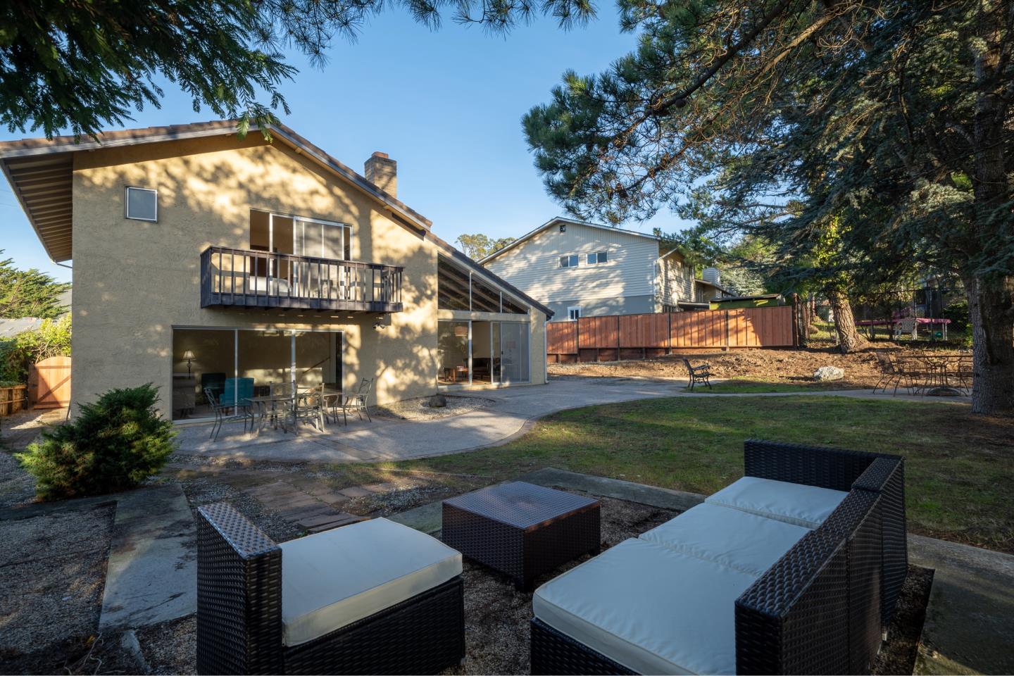 935 Park Pacifica Avenue Pacifica, CA 94044 - Photo 32 of 44 a view of a house with a yard