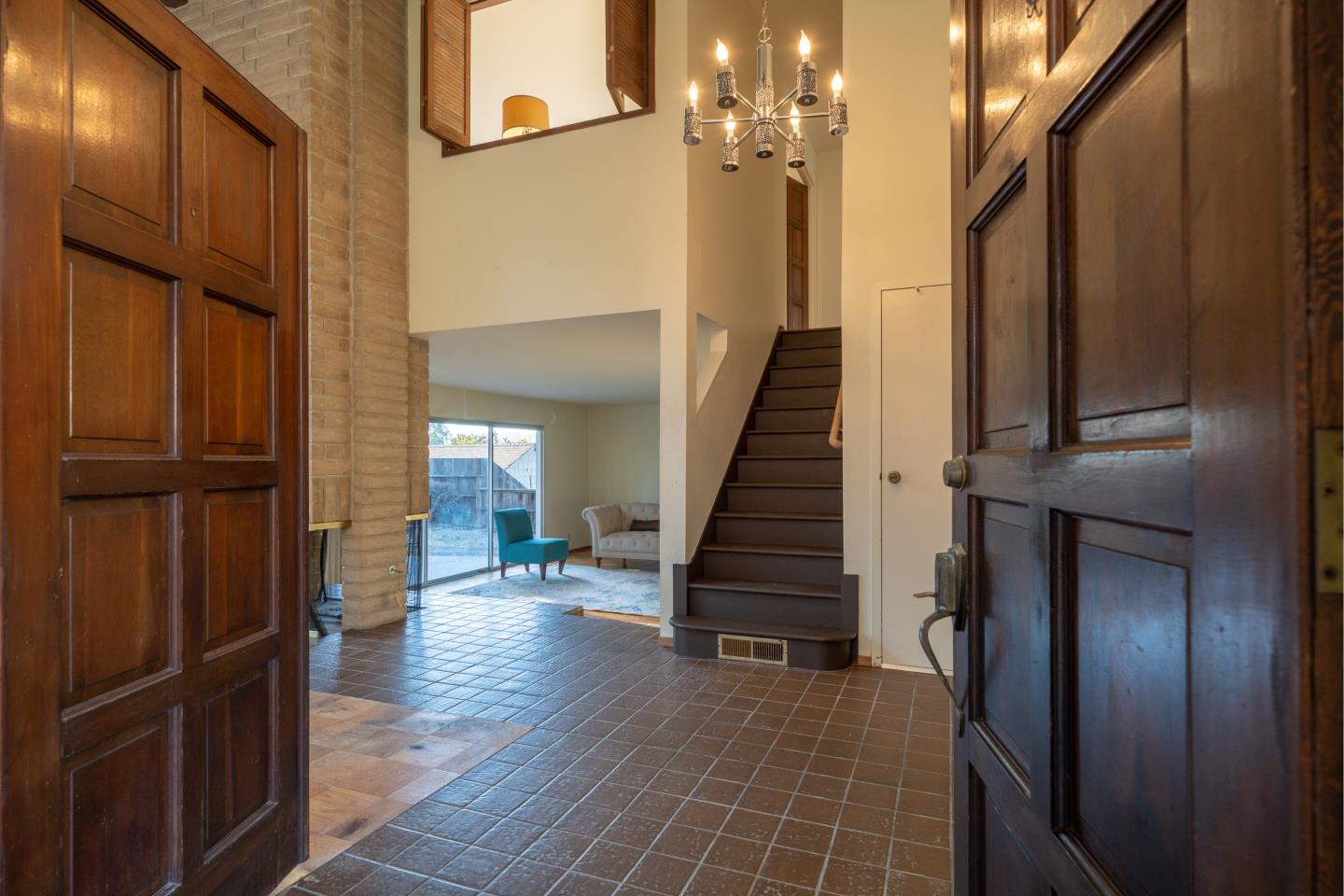 935 Park Pacifica Avenue Pacifica, CA 94044 - Photo 5 of 44 a view of a hallway with wooden floor and staircase