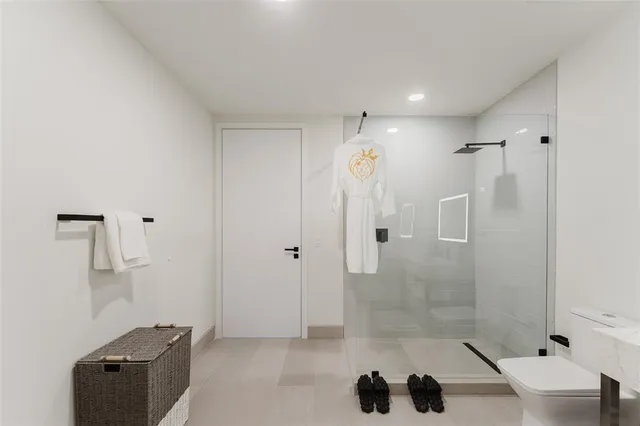 a bathroom with a shower curtain and a sink