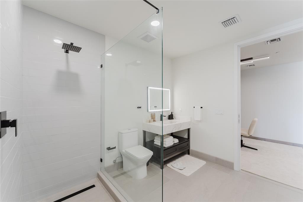 2750 Griffin Road, Unit 412 Fort Lauderdale, FL 33312 - Photo 25 of 47 a bathroom with a sink toilet and shower