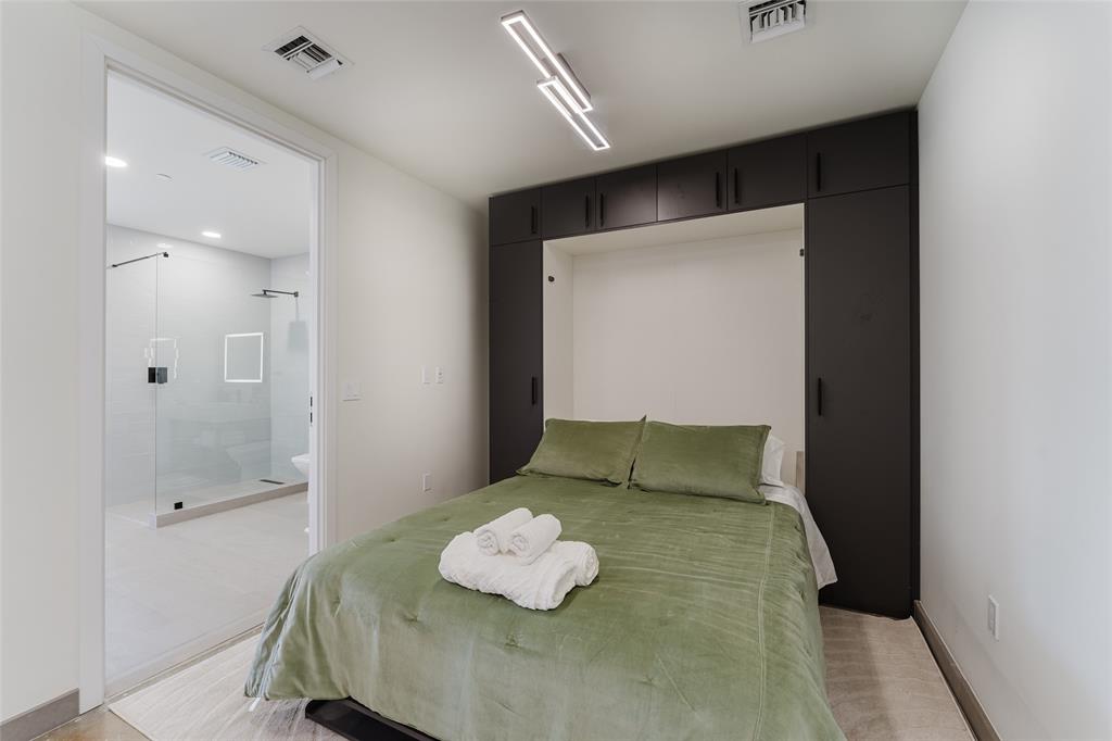 2750 Griffin Road, Unit 412 Fort Lauderdale, FL 33312 - Photo 35 of 47 a bedroom with a bed and a couch