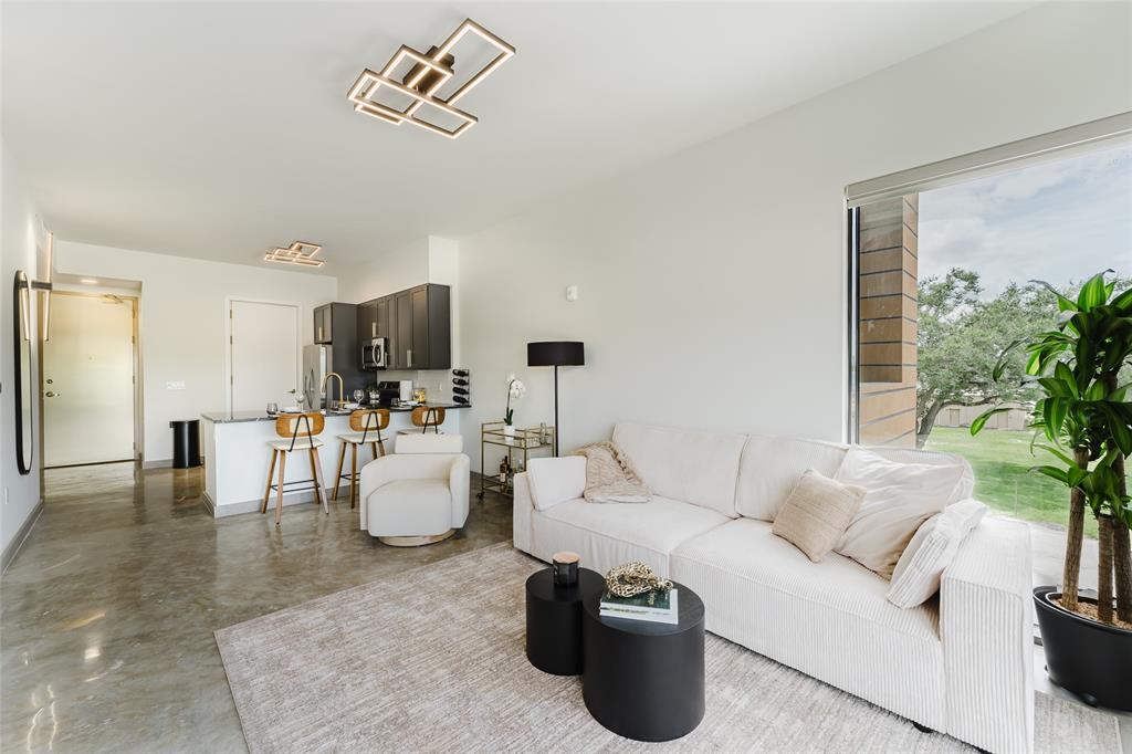 2750 Griffin Road, Unit 412 Fort Lauderdale, FL 33312 - Photo 8 of 47 a living room with furniture and a potted plant