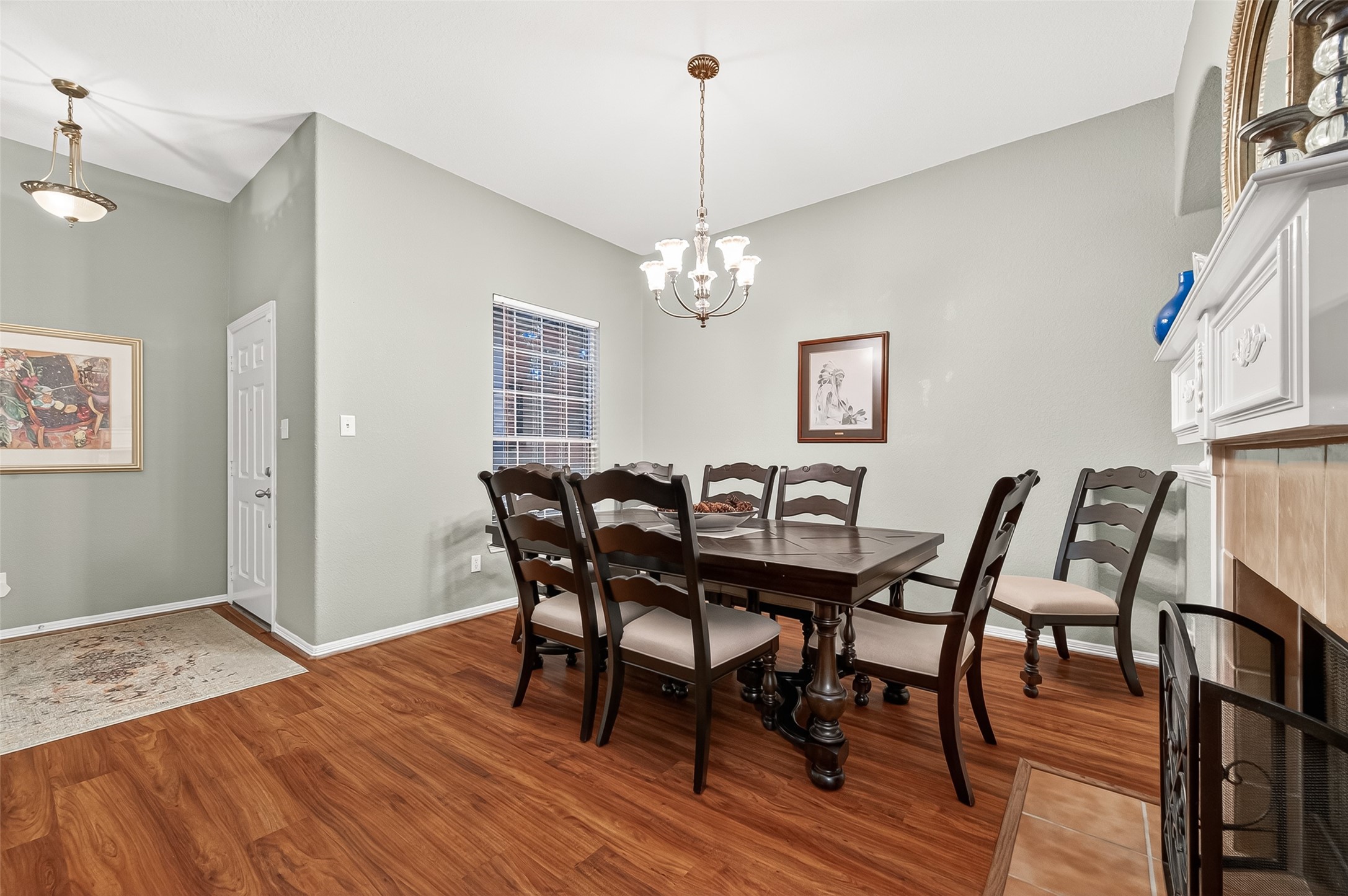 12455 West Summerlin Conroe, TX 77302 - Photo 6 of 31 a view of a dining room with furniture and wooden floor