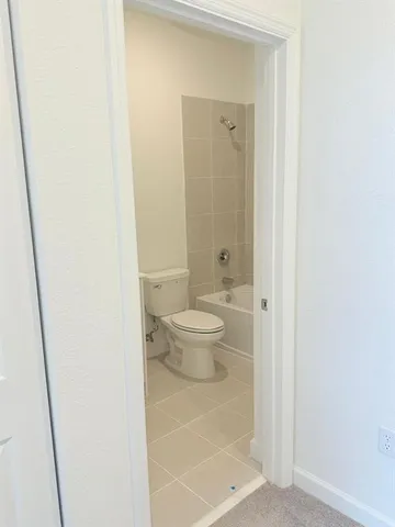 a view of balcony with furniture