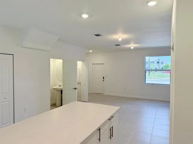 a view of a kitchen with a sink