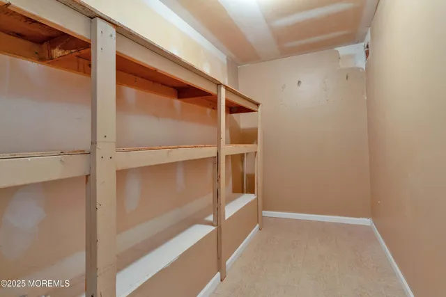 a view of backyard of house with green space