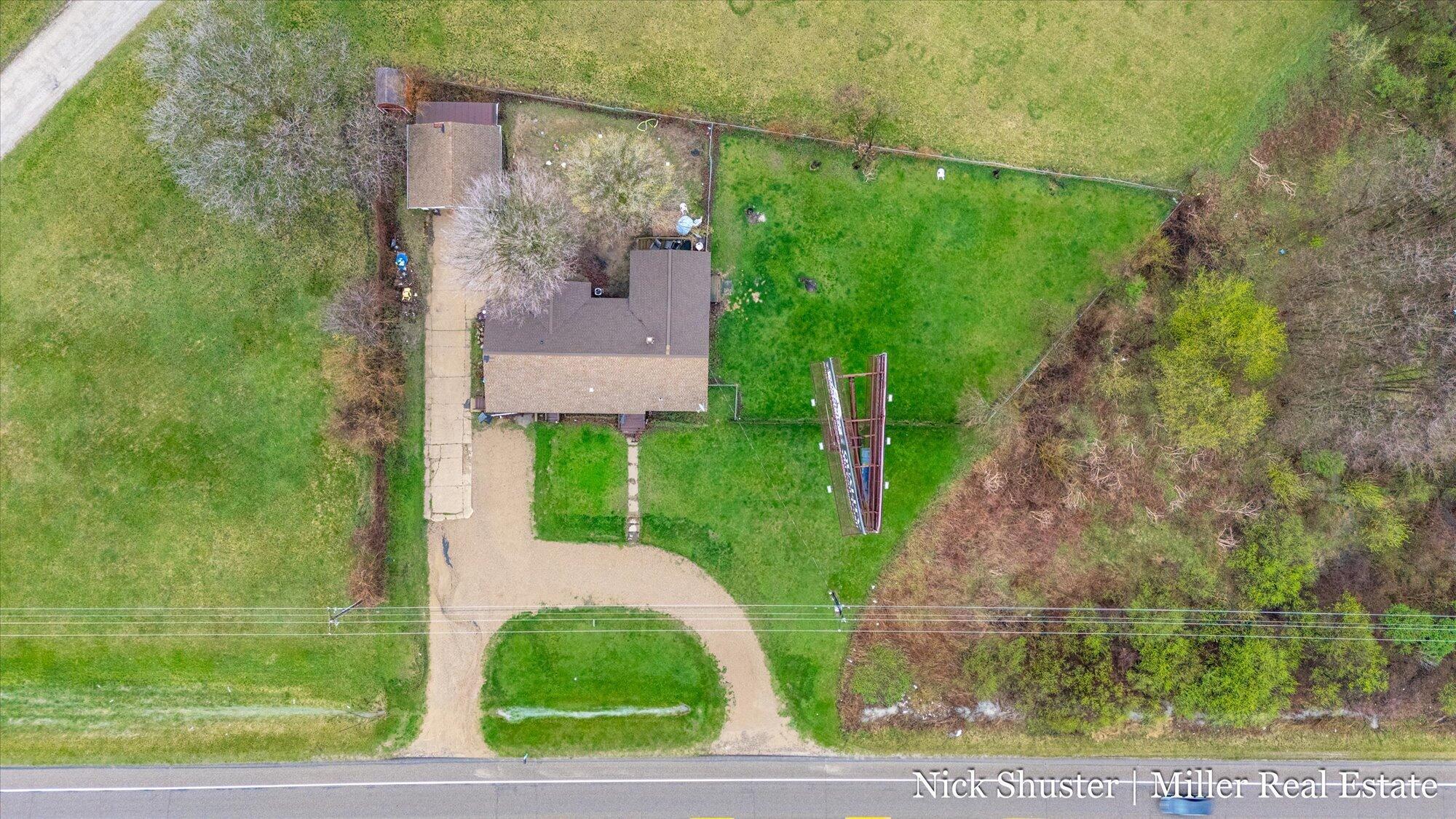 5375 Lansing Road Potterville, MI 48876 - Photo 43 of 46 05-WM5375lansingdrone-4