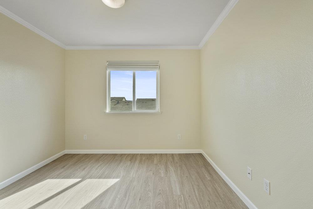 638 Summerfield Drive Soledad, CA 93960 - Photo 39 of 50 a view of a room that has wooden floor and window