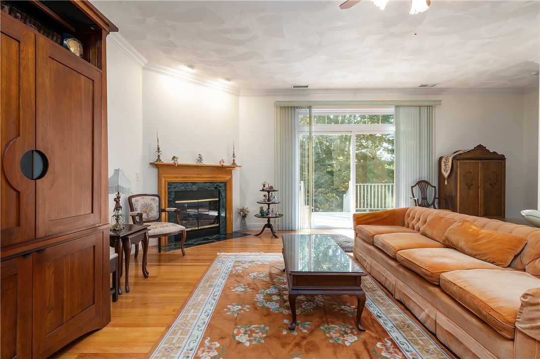 186 Old River Road, Unit 21 Lincoln, RI 02865 - Photo 22 of 34 Living rooms opens to private deck.