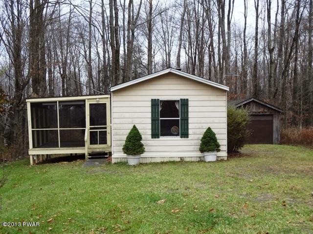 69 Salem Heights Rd Lake Lake Ariel, PA 18436 - Photo 2 of 18 a view of a house with a yard