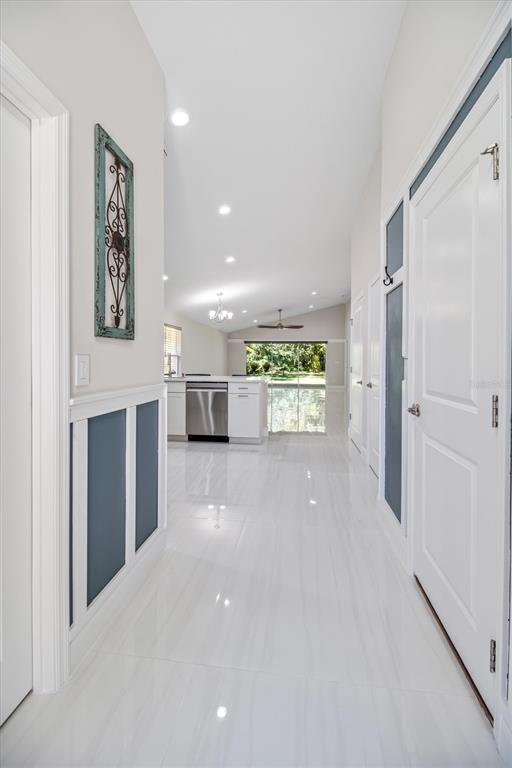 53 Wilmette Avenue Ormond Beach, FL 32174 - Photo 11 of 36 a view of a hallway with closet and a window