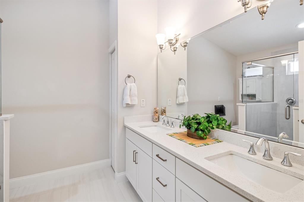 53 Wilmette Avenue Ormond Beach, FL 32174 - Photo 26 of 36 a bathroom with a sink and a mirror