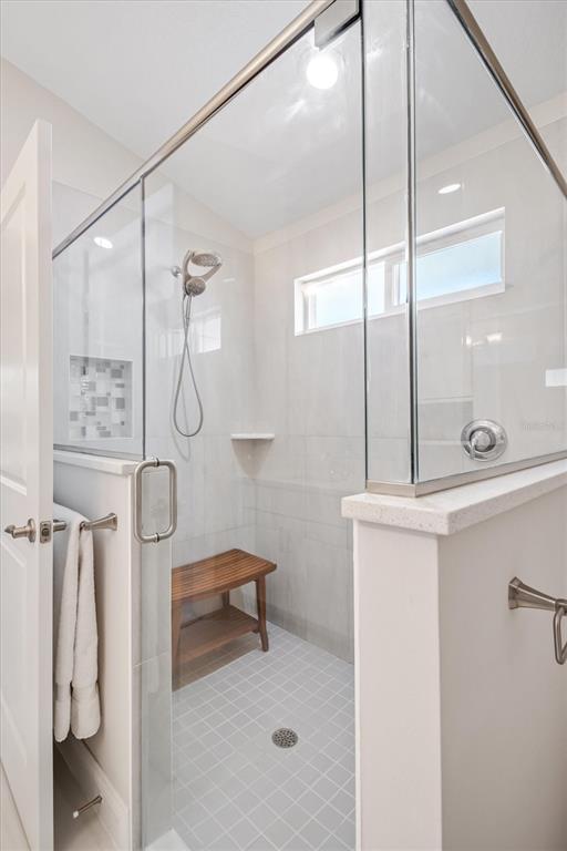 53 Wilmette Avenue Ormond Beach, FL 32174 - Photo 28 of 36 a bathroom with a shower and a sink