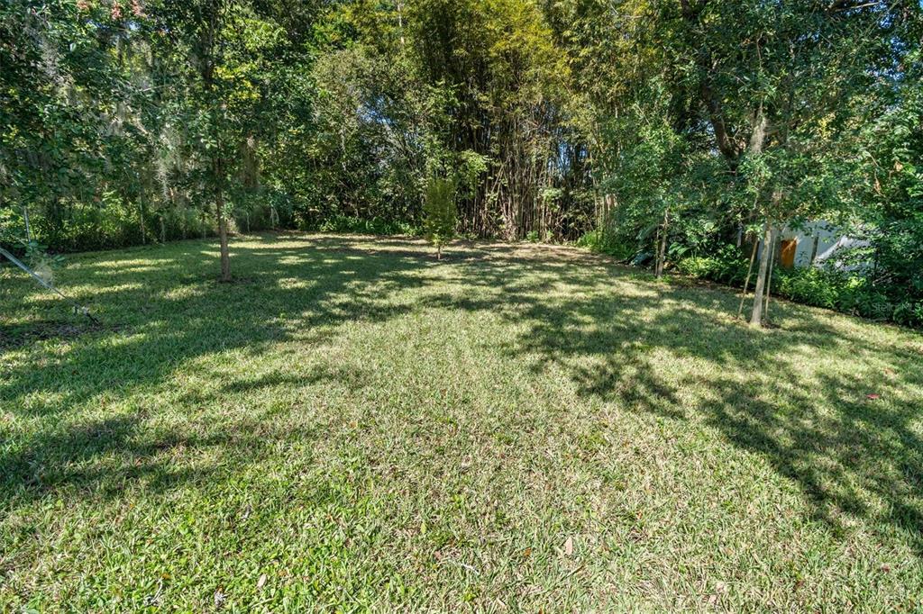 53 Wilmette Avenue Ormond Beach, FL 32174 - Photo 33 of 36 a view of outdoor space with deck and yard