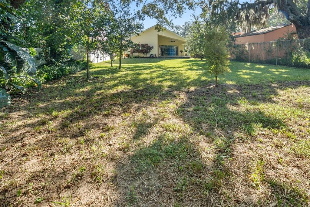 53 Wilmette Avenue Ormond Beach, FL 32174 - Photo 35 of 36 a front view of a house with a yard