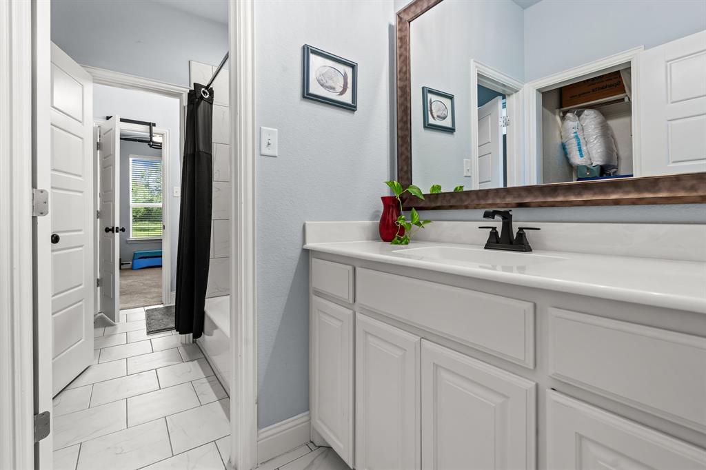 560 Wilson Bend Road Millsap, TX 76066 - Photo 29 of 38 Hollywood Bathroom. Front bedroom vanity.