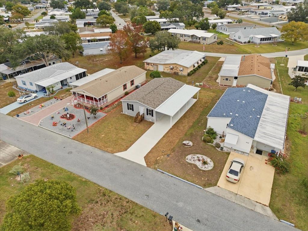 9128 Scepter Avenue Brooksville, FL 34613 - Photo 13 of 44 an aerial view of a house with swimming pool