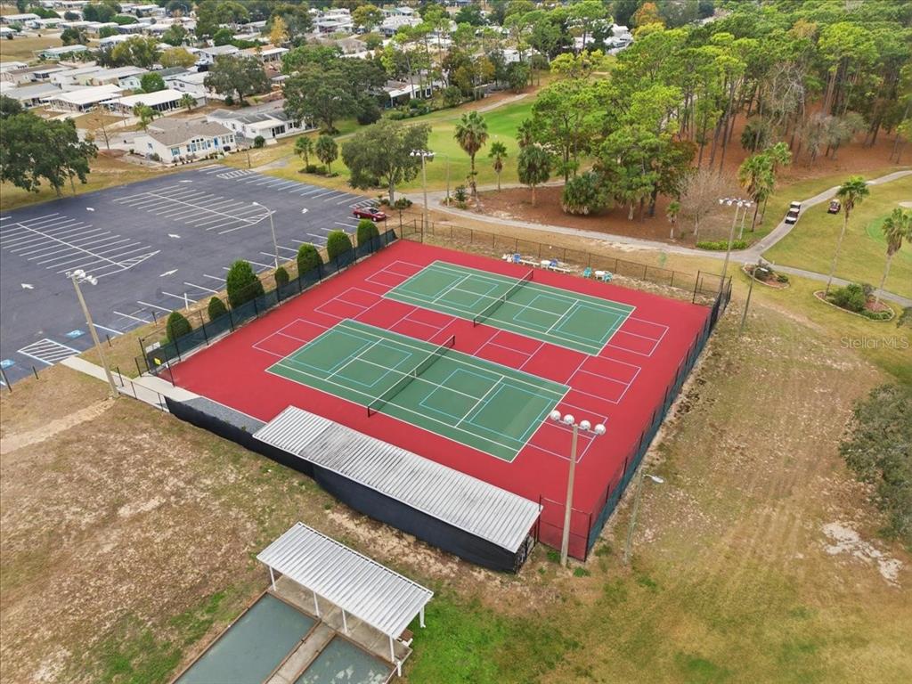 9128 Scepter Avenue Brooksville, FL 34613 - Photo 42 of 44 an aerial view of a yard