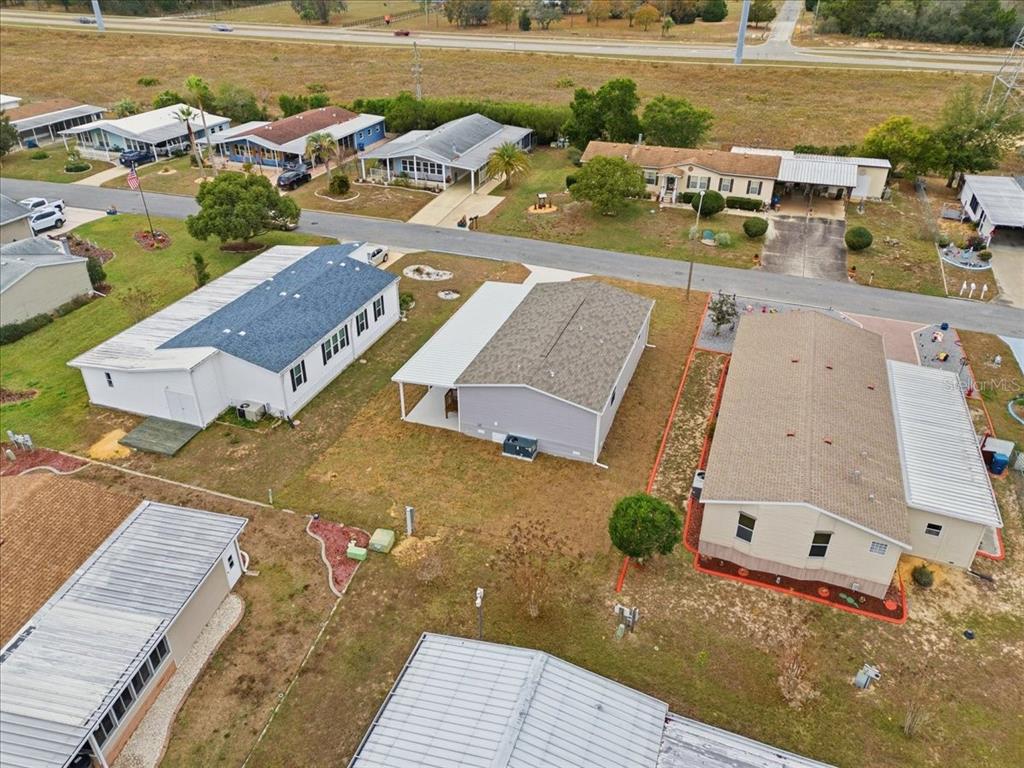 9128 Scepter Avenue Brooksville, FL 34613 - Photo 10 of 44 an aerial view of a house with outdoor space