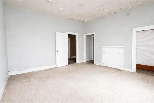 an empty room with an entryway
