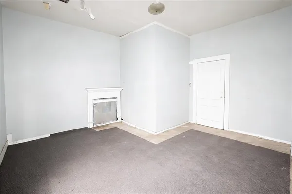 an empty room with a door